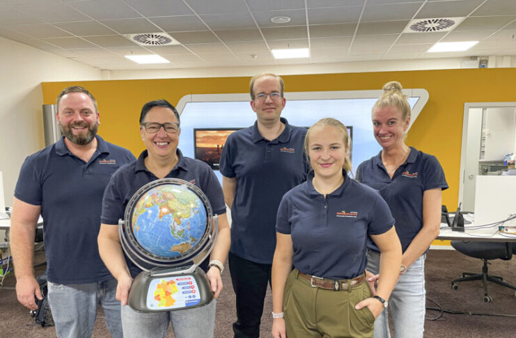 15 Jahre sonnenklar.TV Reisebüro im REWE-Center sonnenklar.TV Reisebüro Kiel-Hassee Teamfoto
